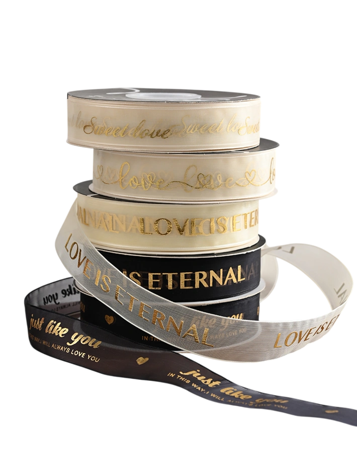 Cuộn ruy băng voan lưới màu kem in kin chữ đồng 2.5cm x 20 yard ảnh 1