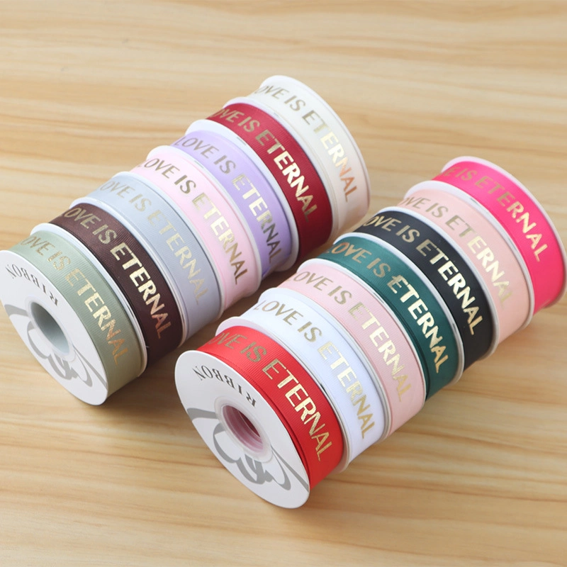 Dây ruy băng gân in chữ đồng Love Is Eternal bản 2.5cm x 30yard nhiều màu ảnh 3